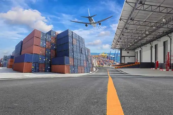 Shipping containers and a cargo plane representing international removals with Military Movers UK